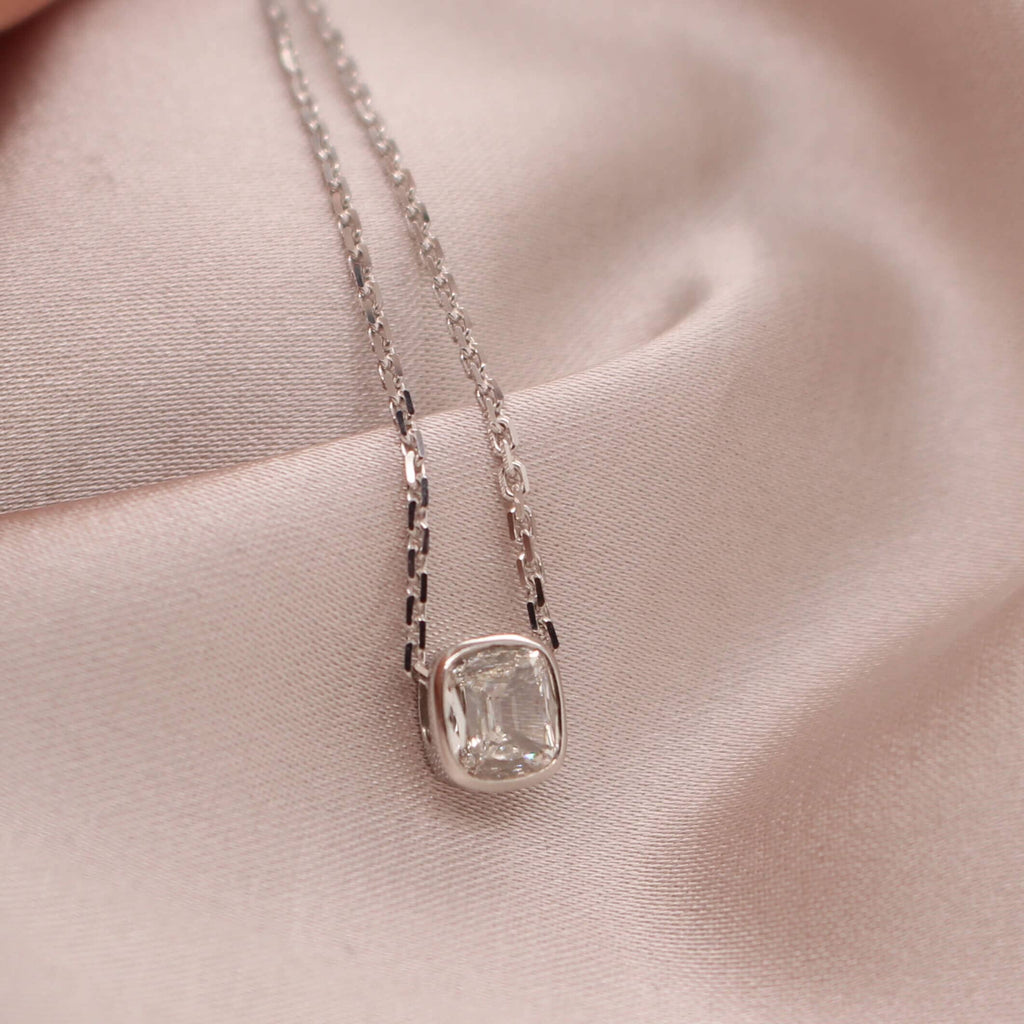  Discover the allure of our Prince Cut Diamond Slider Pendant - a stunning piece that adds a touch of sophistication to any outfit. Shop now and indulge in luxury.