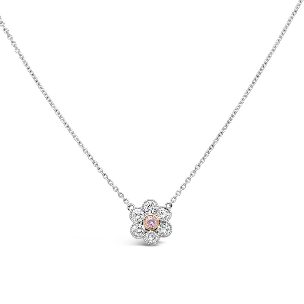 Discover the beauty of our Pink and White Diamond Flower Pendant, a captivating accessory that will make you shine bright.