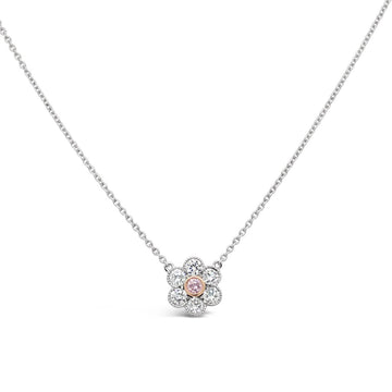 Discover the beauty of our Pink and White Diamond Flower Pendant, a captivating accessory that will make you shine bright.