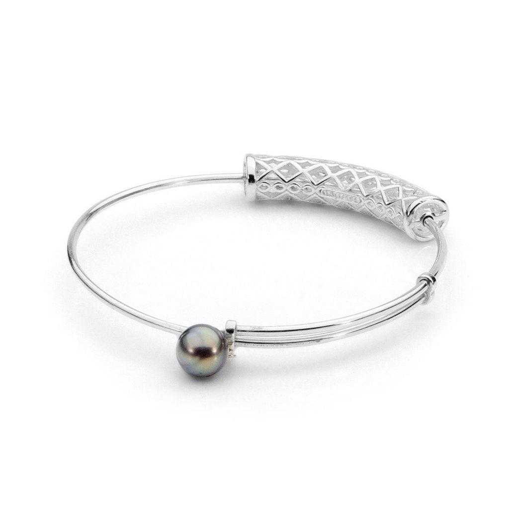 Elevate your style with our exquisite Moroccan Bangle in silver. A timeless piece that adds a touch of elegance to any outfit.