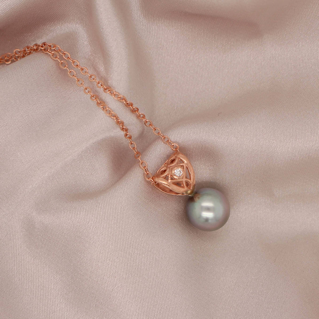 Discover the elegance of our Moroccan diamond pendant in rose gold at Latitude Jewellers.
