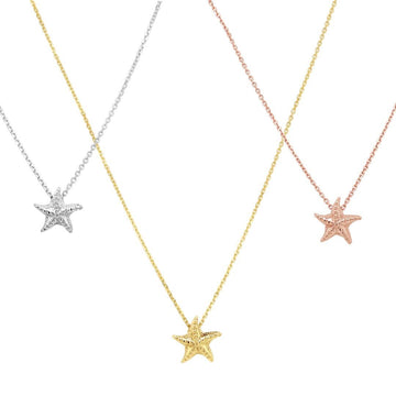 Embrace the beauty of the ocean with our exquisite yellow gold starfish necklet - a small and stunning accessory that will make you shine.