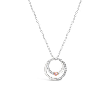 Elevate your style with our exquisite Argyle Circle Pendant, featuring a stunning combination of pink and white diamonds in white gold.