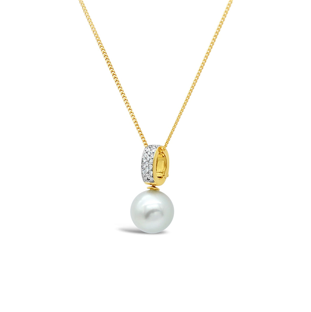 Elevate your style with our exquisite Moonlit Pendant featuring 18ct diamonds and a stunning Abrolhos Island black pearl. Shop now at Latitude Jewellers!