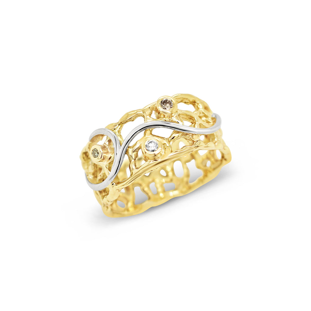 Discover the allure of the Coral Treasure Ring in gold - a captivating piece that exudes elegance and sophistication.