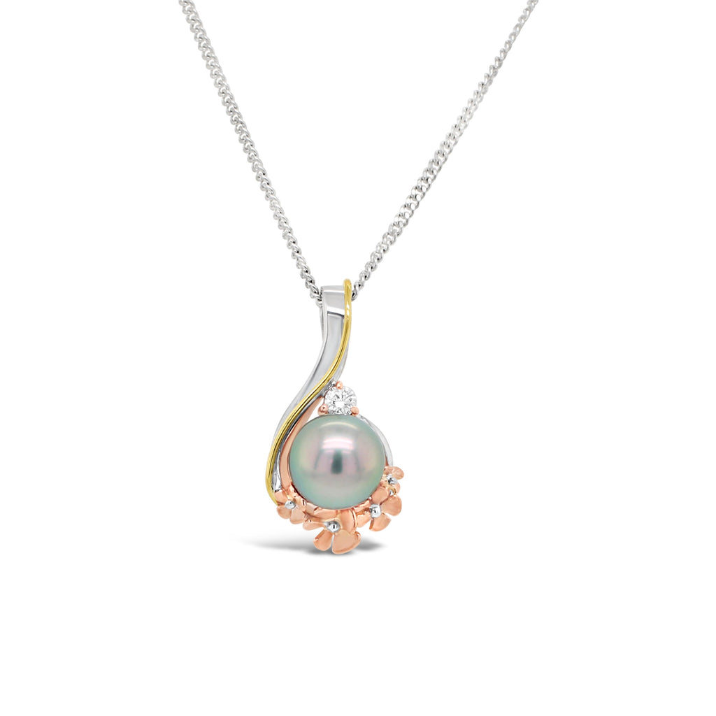 Discover the beauty of nature with our stunning Wildflower Diamond and Abrolhos Pearl Pendant.