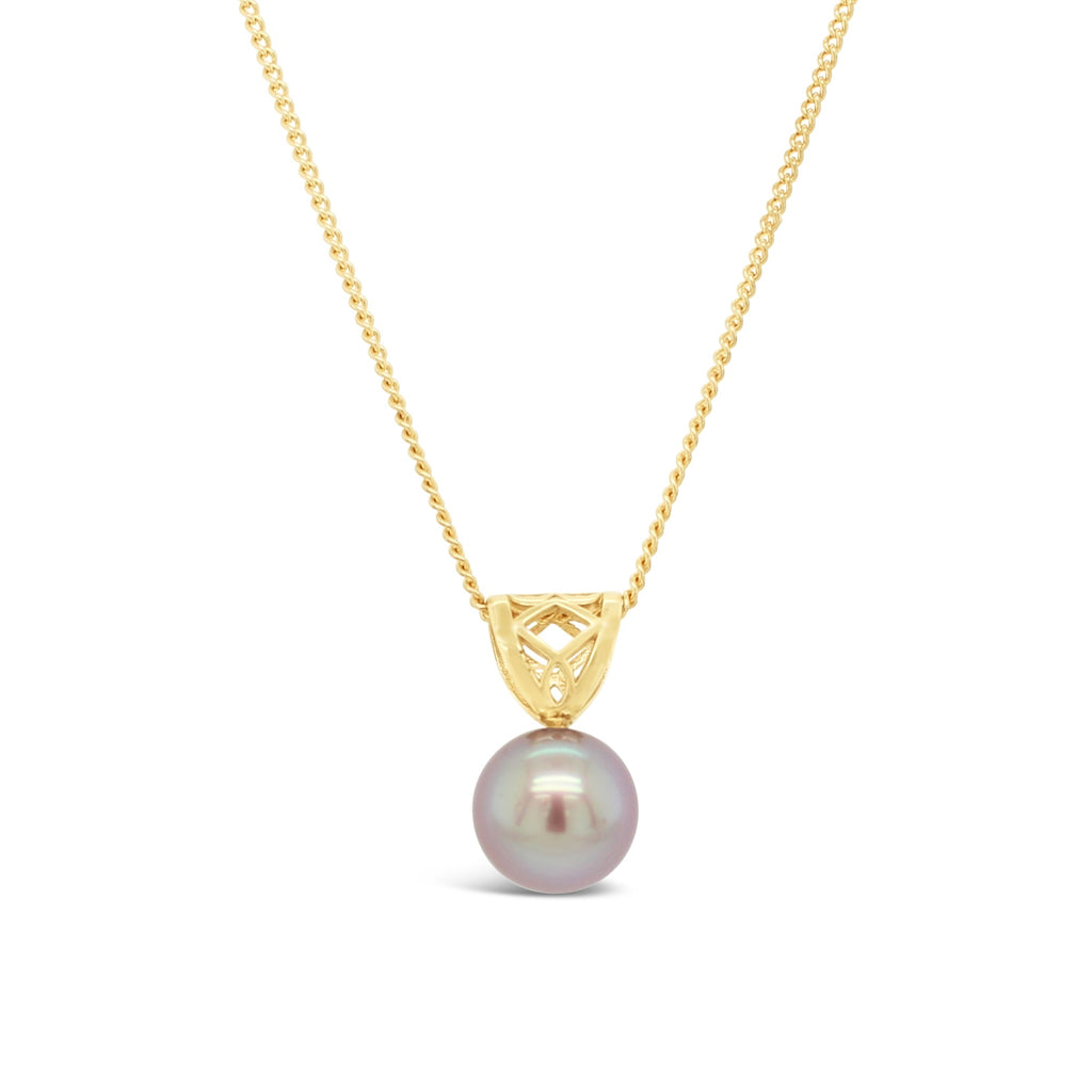 Indulge in elegance with our yellow gold Moroccan pendant, featuring a captivating 11mm Abrolhos Island black pearl. Experience luxury at Latitude Jewellers now