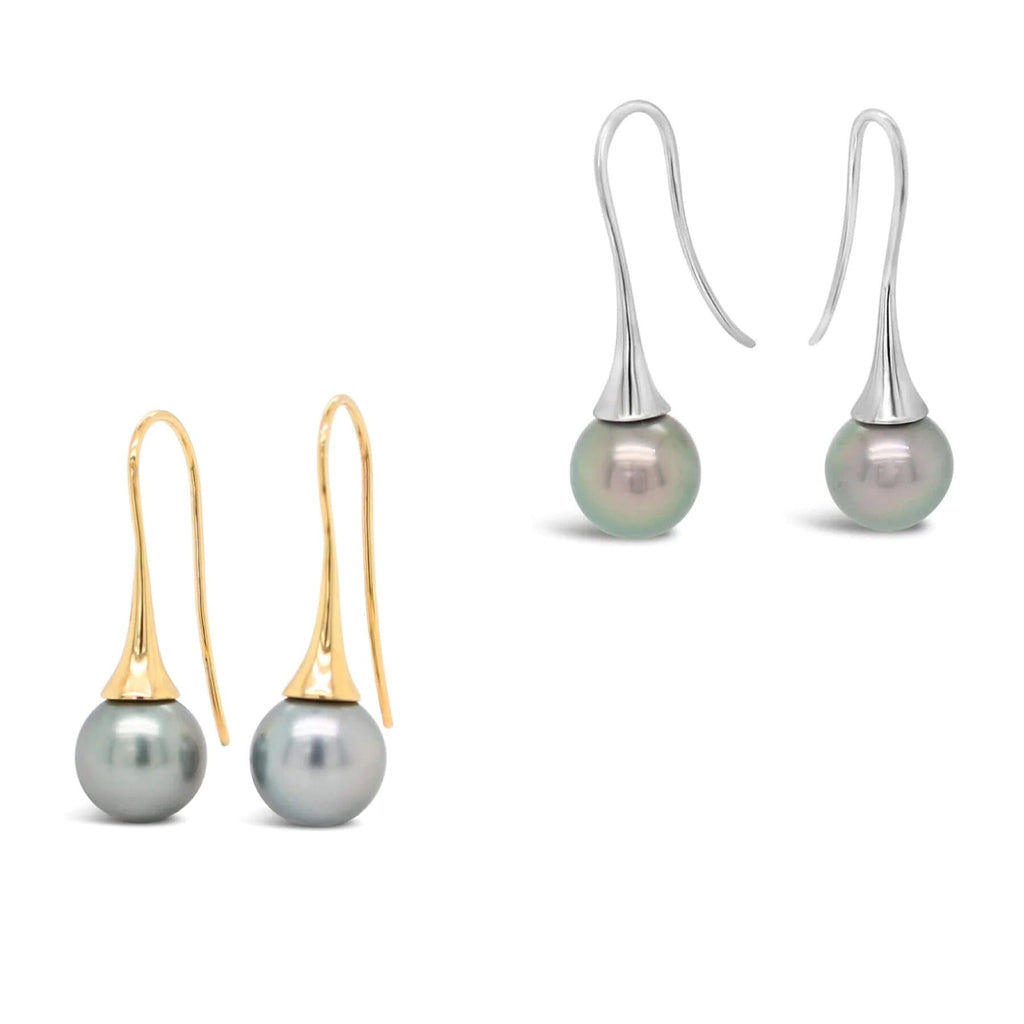  Elevate your style with our signature flute earrings adorned with exquisite Abrolhos pearls.