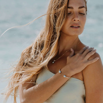  Elevate your style with our exquisite Pia Cuff featuring Abrolhos Island Black Pearls, crafted in stunning yellow gold. Shop now at Latitude Jewellers.