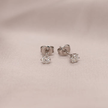 Elevate your style with our exquisite diamond earrings, featuring a total carat weight of 0.30ct. Shop now at Latitude Jewellers