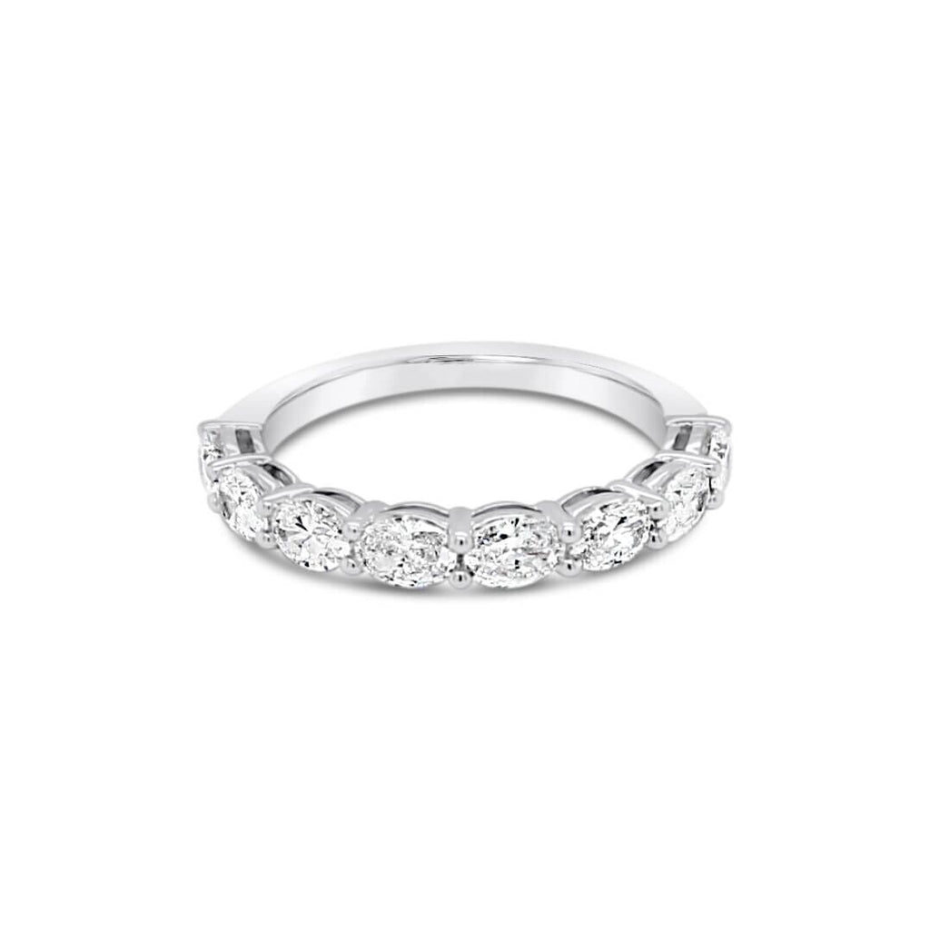Discover the timeless elegance of the Eternity Oval Lab Diamond Ring by Olyv at Latitude Jewellers.