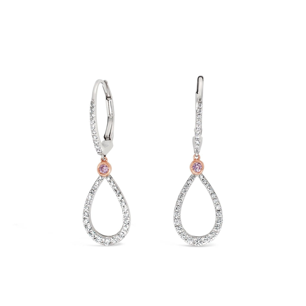 Discover the perfect blend of elegance and sophistication with our white teardrop earrings featuring stunning pink diamonds sourced from the prestigious Argyle Mine