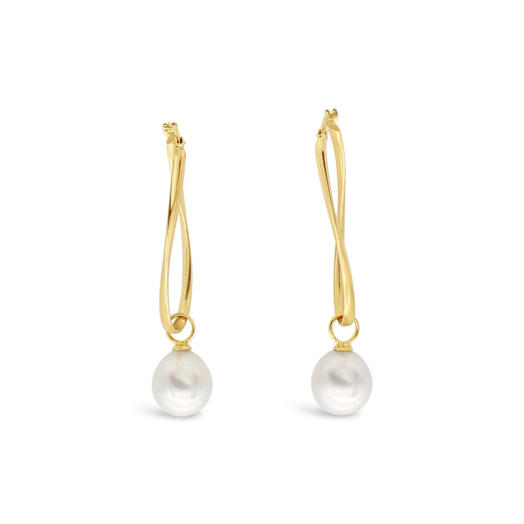 Elevate your style with our Slim Island Hoops featuring interchangeable South Sea Pearls. Discover the perfect accessory to add a touch of elegance to any outfit at Latitude Jewellers.