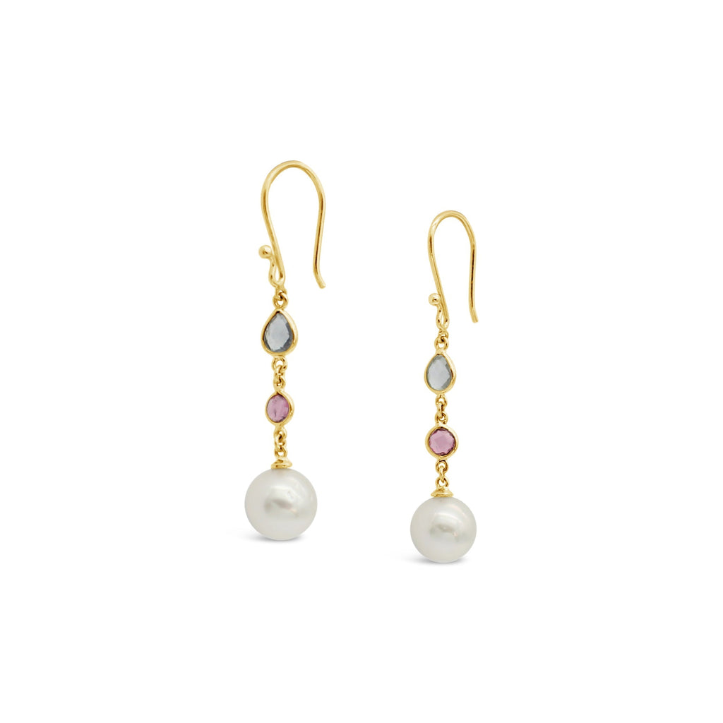 Elevate your style with our exquisite Aqua Rosa Earrings in gold, adorned with lustrous South Sea pearls. Discover timeless elegance at Latitude Jewellers.