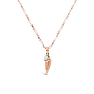 Elevate your style with our stunning rose gold cone shell pendant featuring a mesmerizing Abrolhos Keshi pearl. Shop now at Latitude Jewellers!