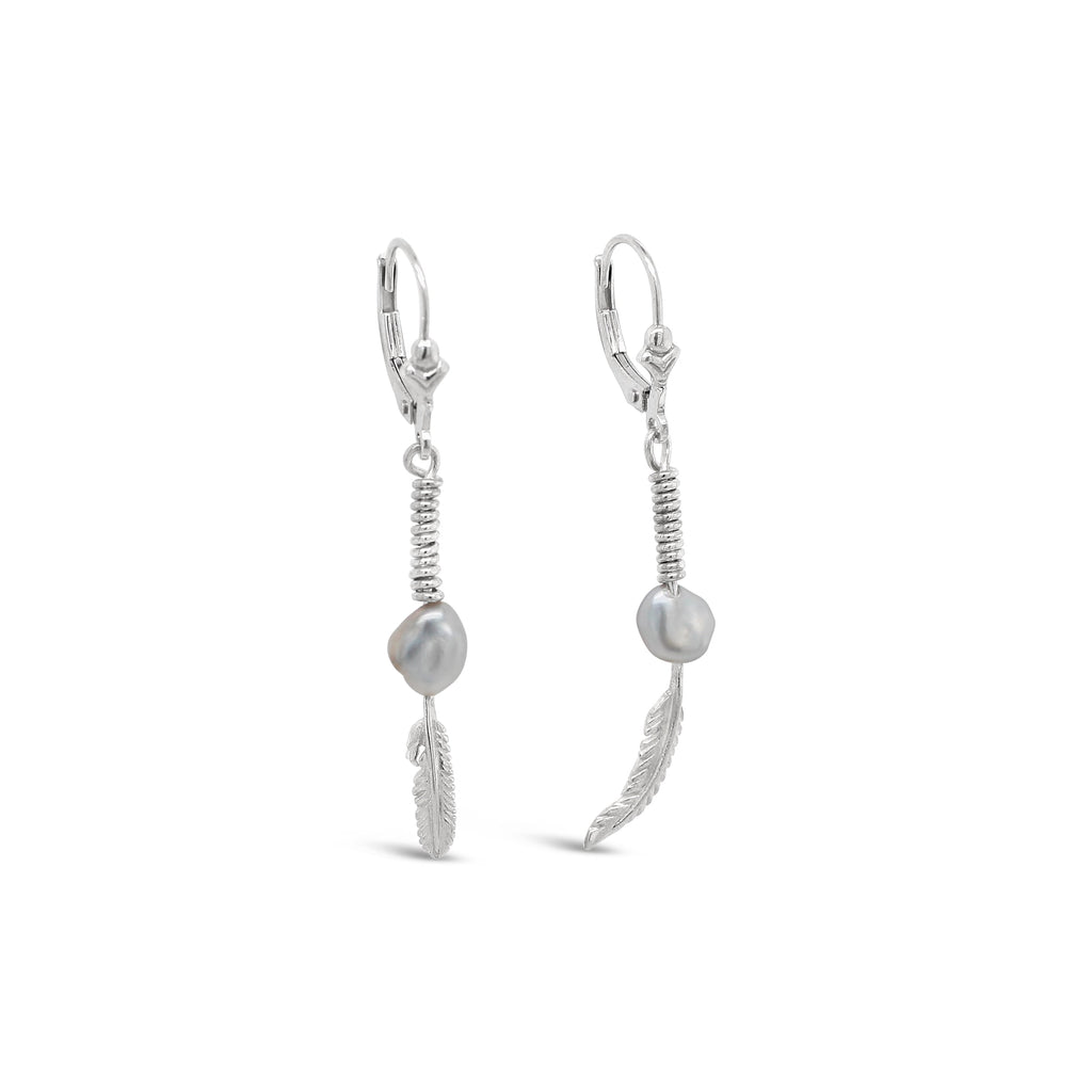  Indulge in the timeless charm of our Sterling Silver Feather & Pearl Earrings, a must-have for every jewelry lover.