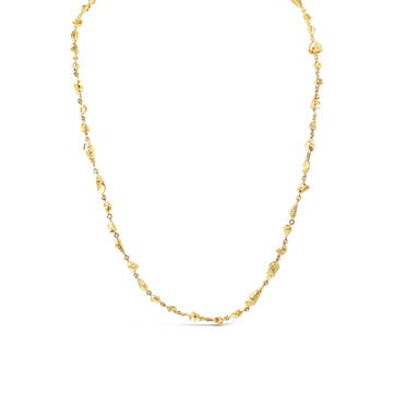 Elevate your style with our exquisite continuous shell necklet in gold. Shop now and make a statement with this stunning piece from Latitude Jewellers.