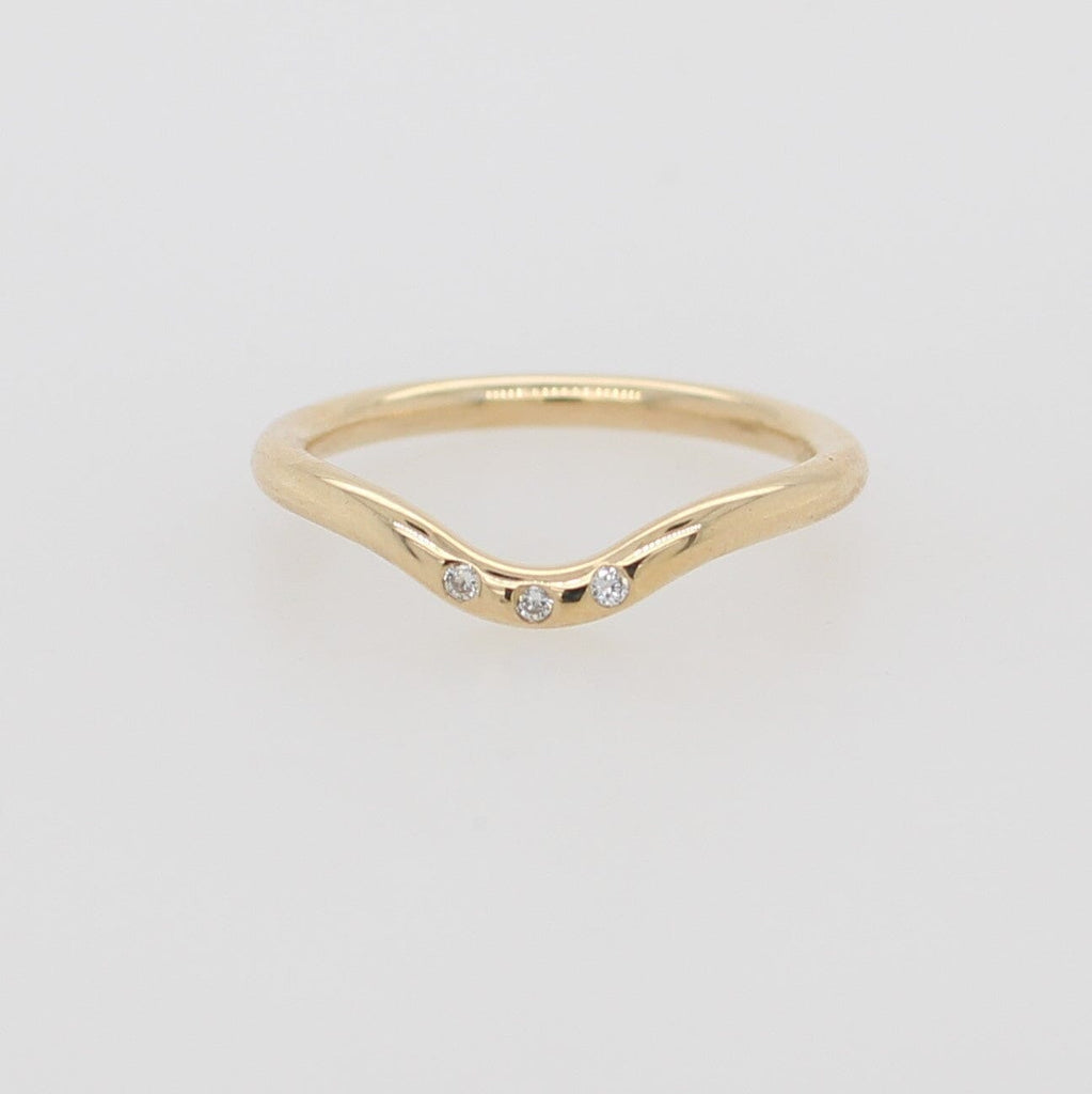 Elevate your style with our Eternity Lustre Ring, a stunning 9ct yellow gold ring adorned with three dazzling diamonds.