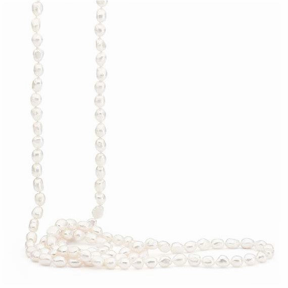 Elevate your style with our exquisite long white freshwater Keshi pearl strand. Discover timeless elegance at Latitude Jewellers.