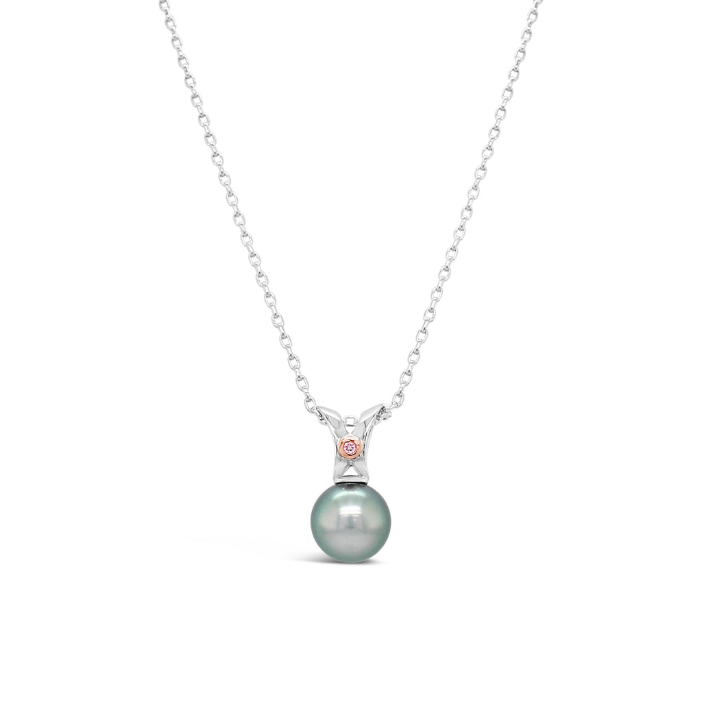 . Elevate your style with our exquisite Pink Argyle Diamond on 9ct White Gold Split Bail Pendant featuring a stunning Abrolhos Island Pearl.