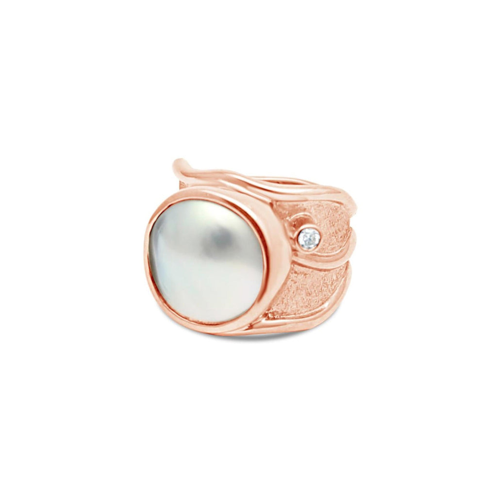Discover the enchanting allure of our Solid Rose Gold Lexi Ring, designed to add a touch of sparkle to any occasion.