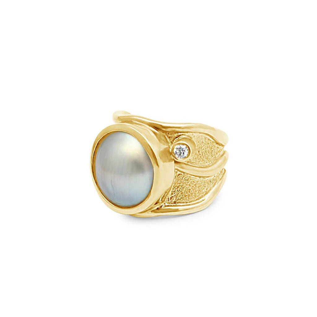 Elevate your style with our exquisite solid yellow gold Lexi ring - a timeless piece that exudes elegance and sophistication.