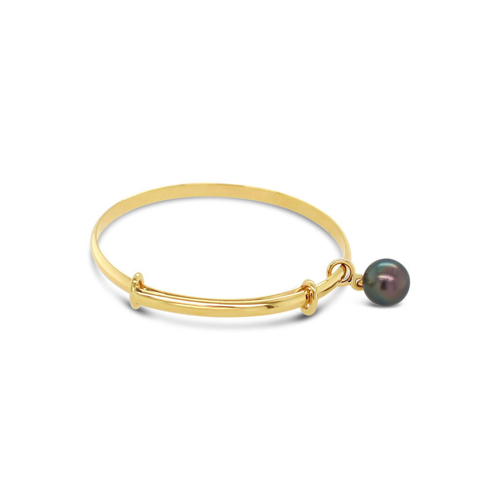 Elevate your style with the exquisite Bambina Bangle in gold from Latitude Jewellers.
